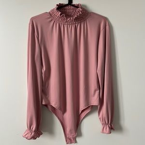 Pink longsleeve bodysuit, fits like a large